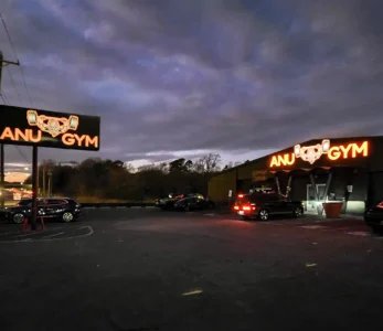 Anu Gym at Night Storefront signage in charlotte