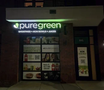 PureGreen at Night Storefront signage in charlotte