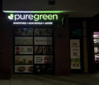 PureGreen at Night Storefront signage in charlotte