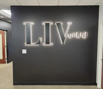 Illuminated Logo Lobby Signage