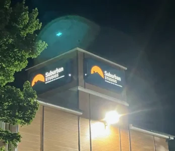 Illuminated storefront signage for hotel